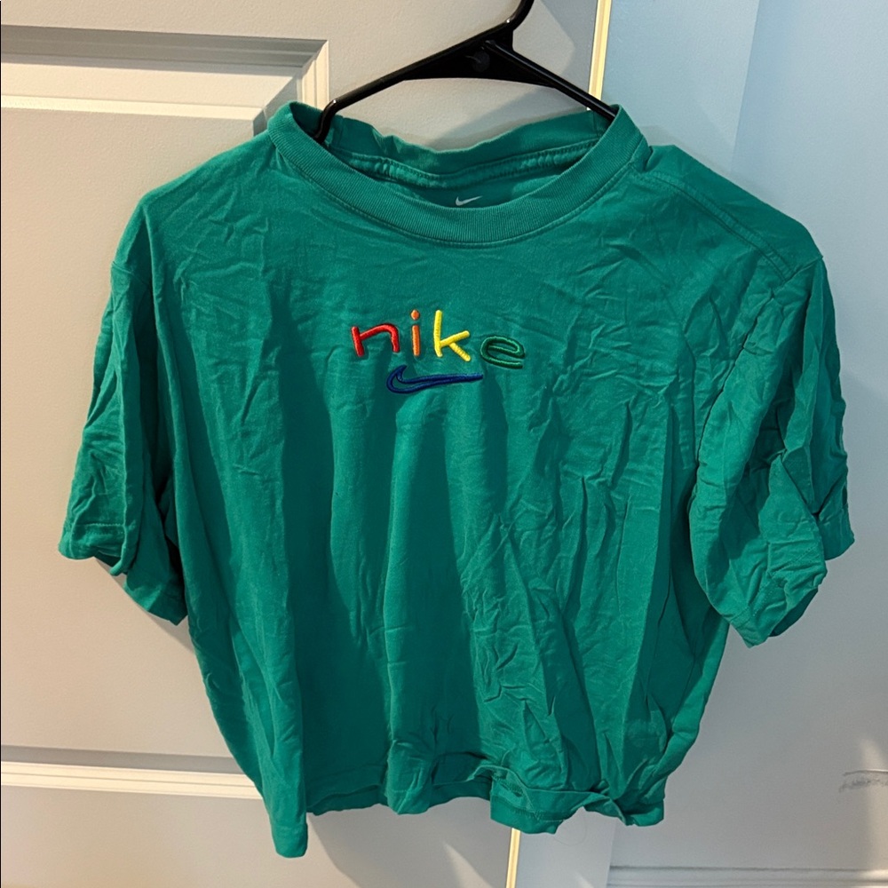 Nike womens Teal T-Shirt with Multicolor Logo
